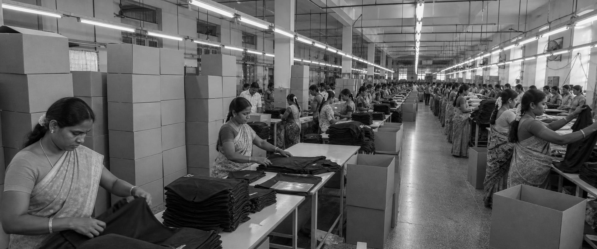 Packing and quality-check lines on the Knittire factory floor in Tirupur